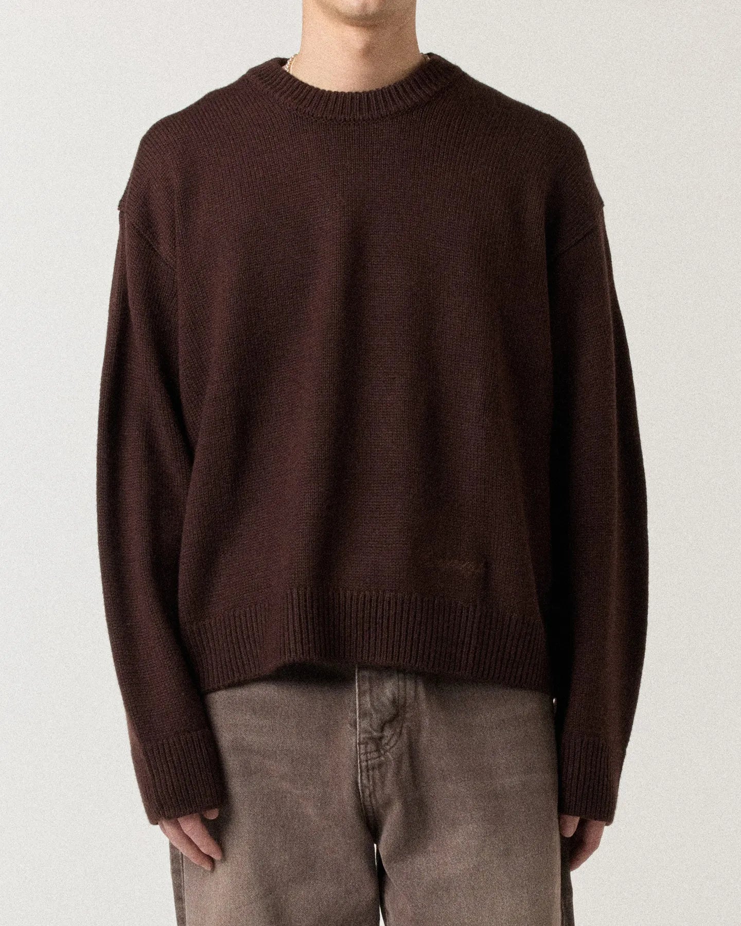 Model wearing RONNING R Knit Sweater in Mocha Brown