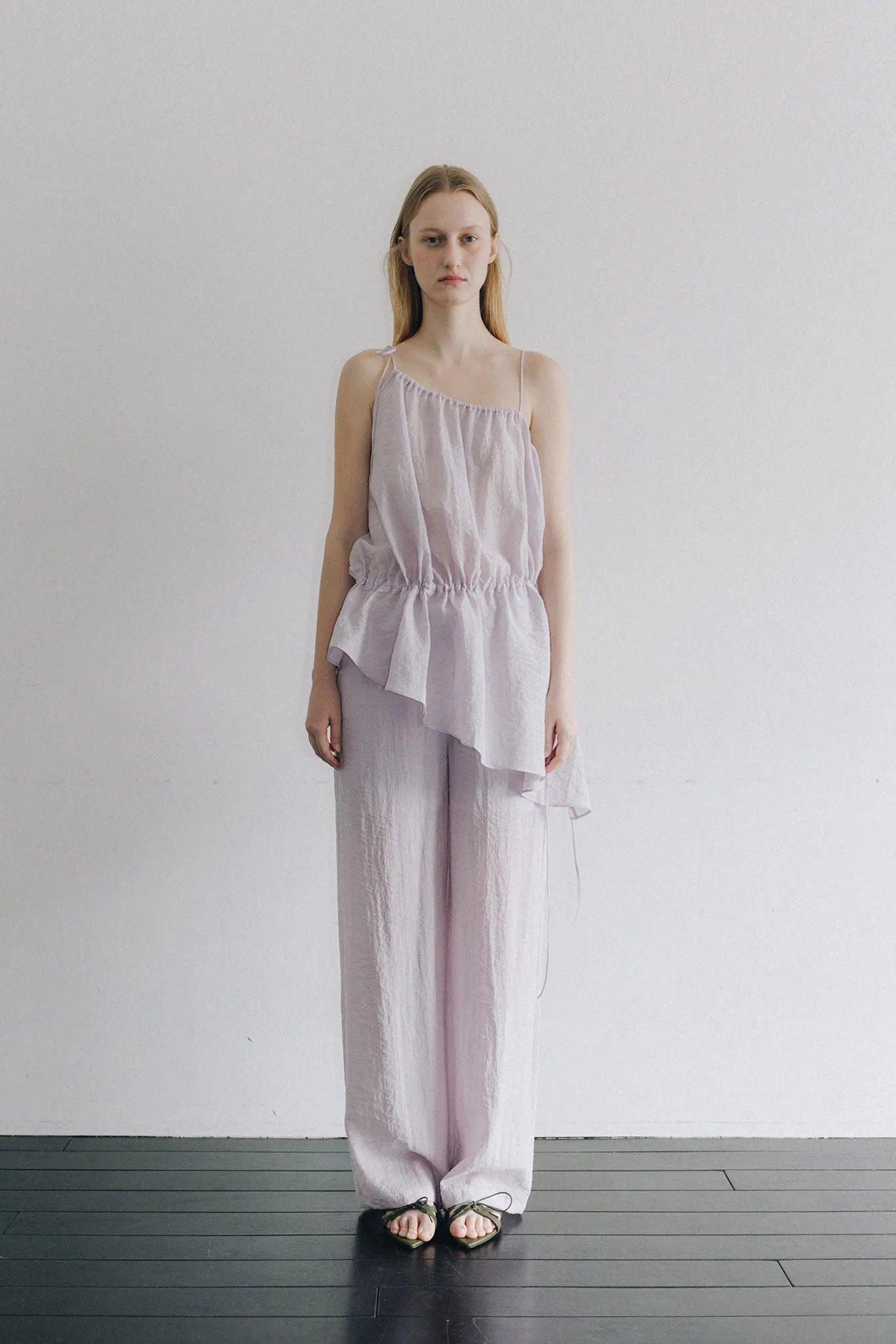 Model wearing Asymmetrical Waist-Tie Dress in Purple