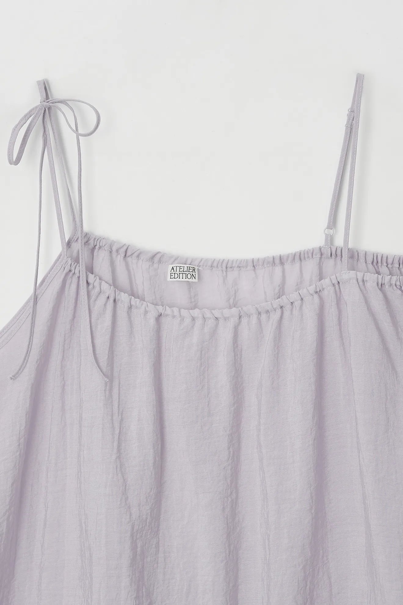 Neckline detail of Asymmetrical Waist-Tie Dress in Purple