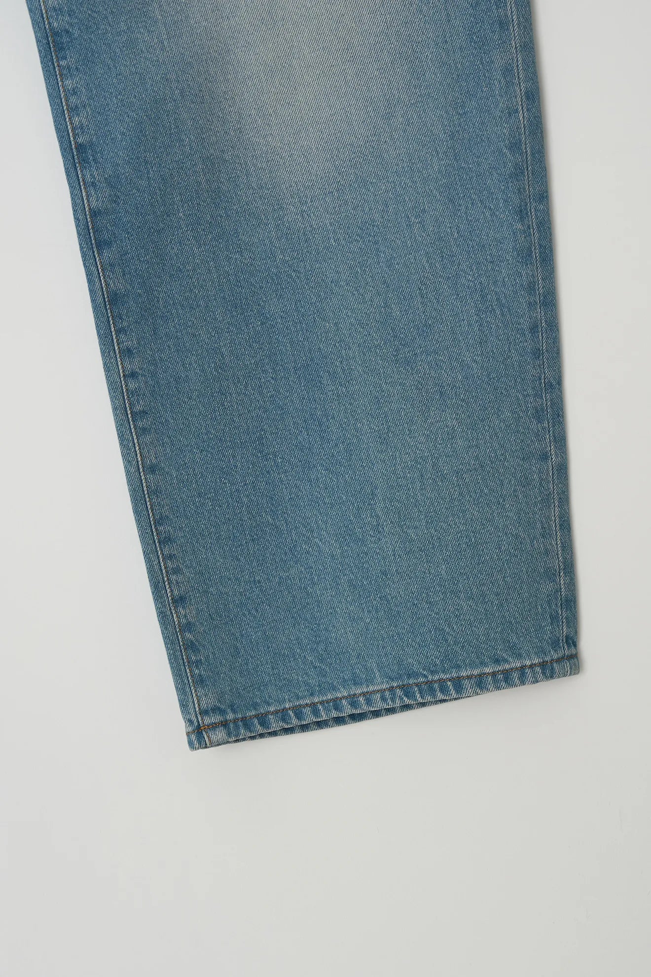 Atelier Edition Cinch Back Denim Blue hem detail