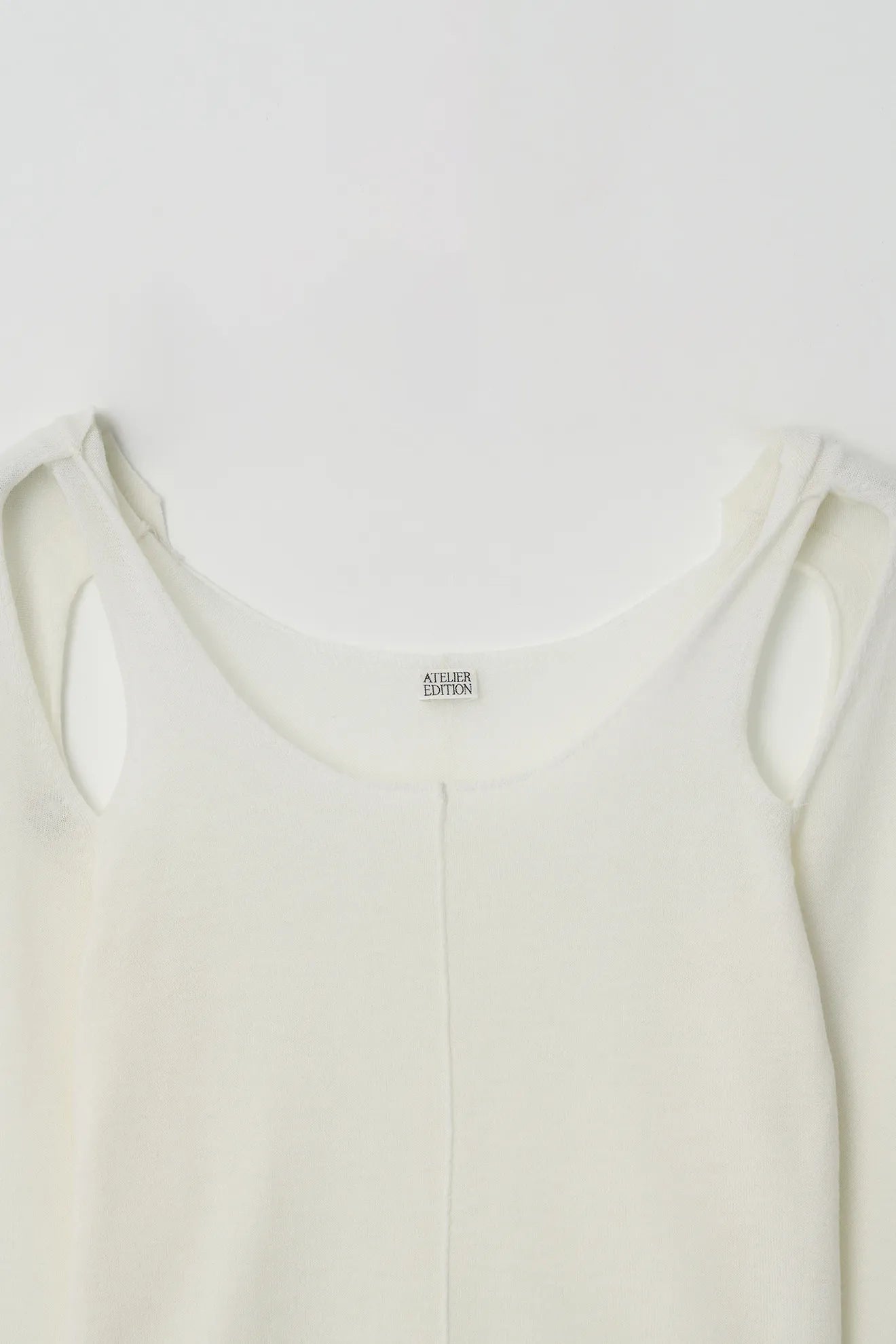 Atelier Edition Cut-Out Detail Wool Knit Top in Cream neckline detail