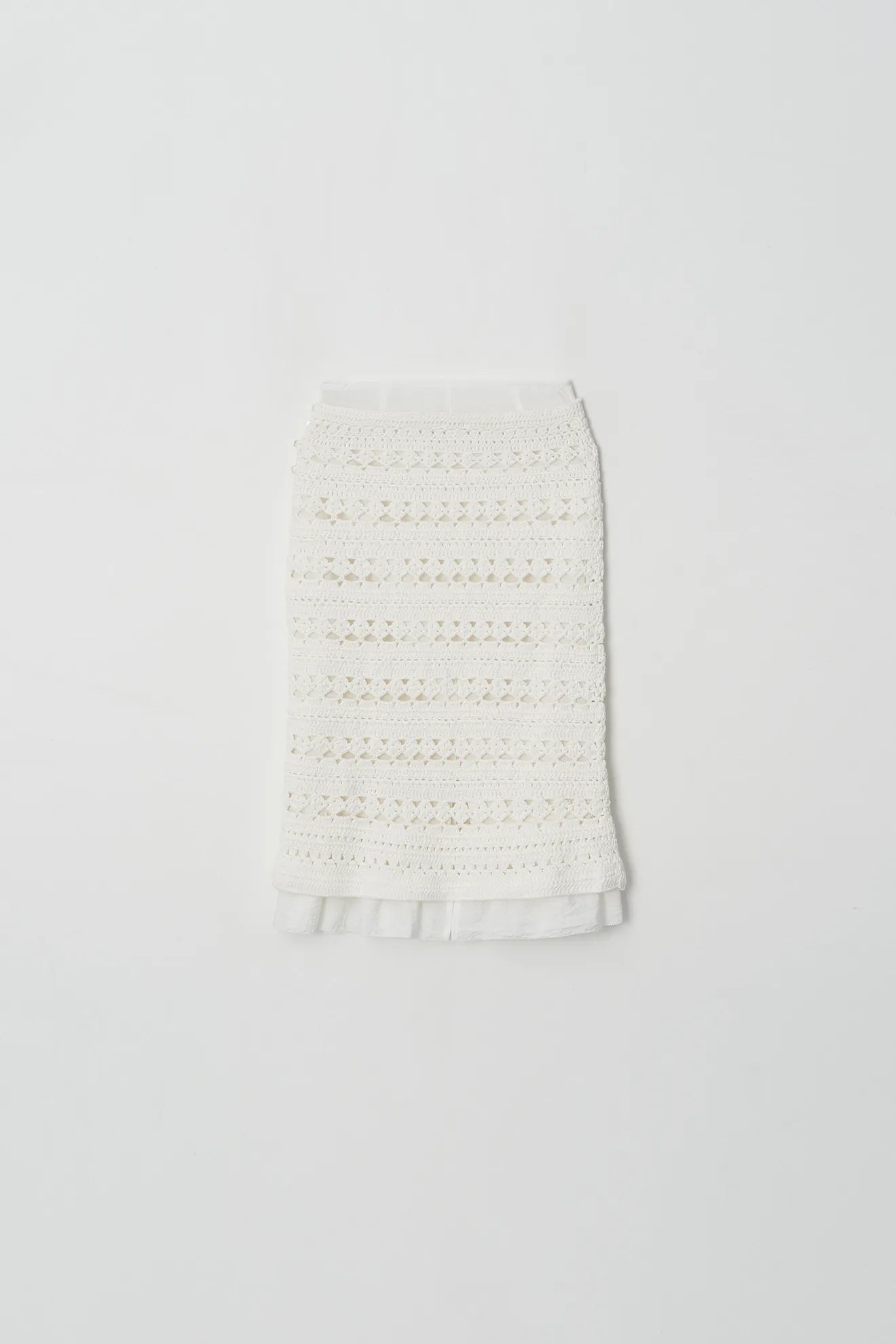 Back view of Atelier Edition Hand-Knitted Frill Skirt Ivory
