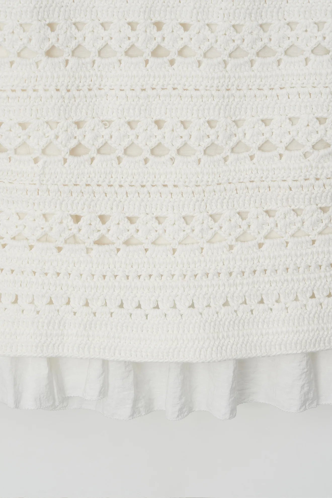 Frill hem detail on Atelier Edition Hand-Knitted Frill Skirt Ivory