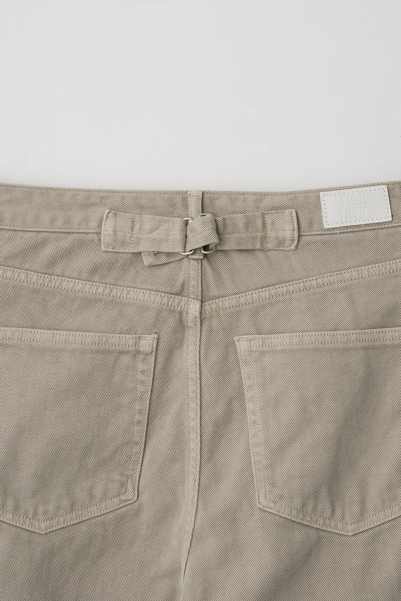 Atelier Edition Overdyed Denim Light Khaki back pocket detail