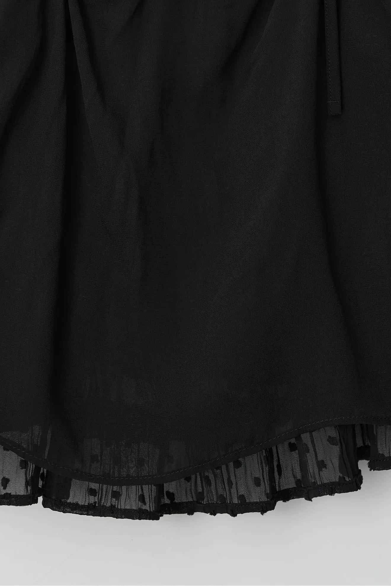 Lace hem detail on Atelier Edition Shirring String Pleated Top Black
