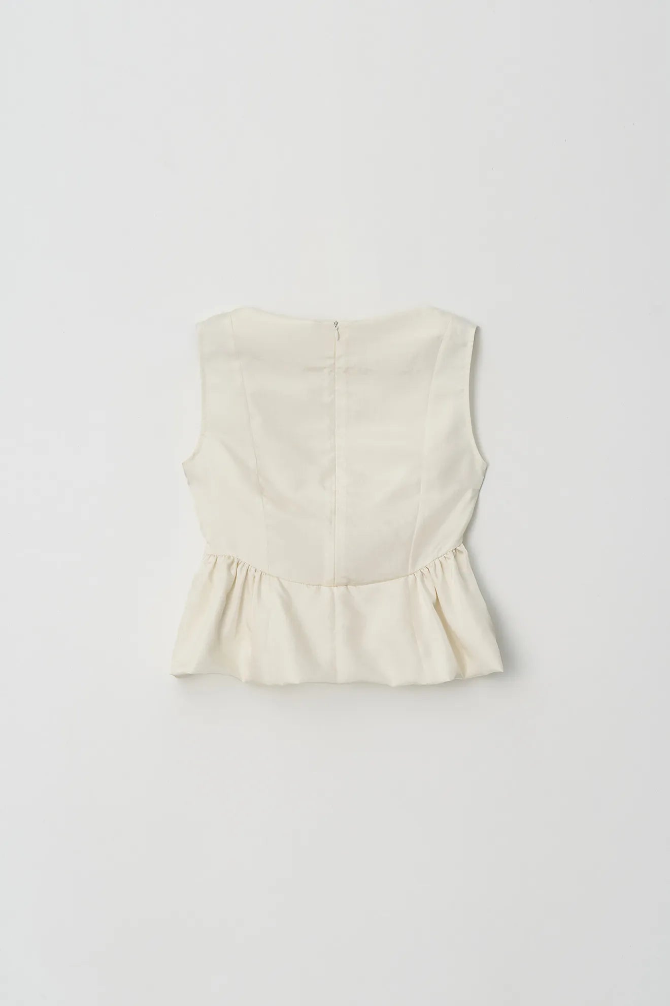Back view of Atelier Edition Sleeveless Flounce Blouse Cream