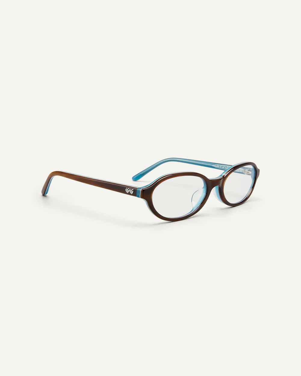 Side view of Bonnie Clyde Baby Layered Teal Demi Clear