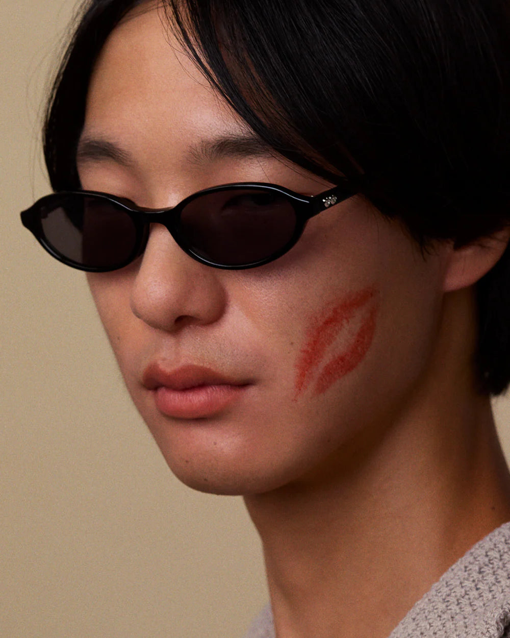 Close up model wearing Bonnie Clyde baby sunglasses black black minimal style