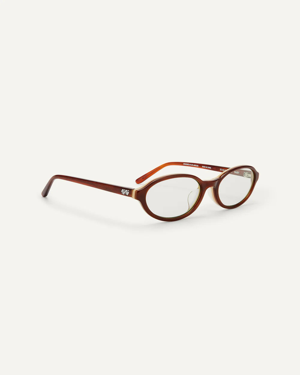 Side view Bonnie Clyde baby sunglasses layered brown clear slim oval frame