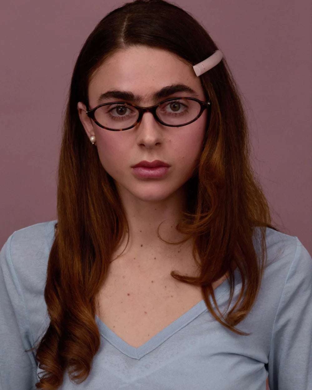 Model wearing Bonnie Clyde baby sunglasses tortoise clear front view
