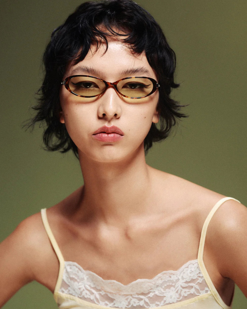 Model wearing Bonnie Clyde Pixie Sunglasses Tortoise Green
