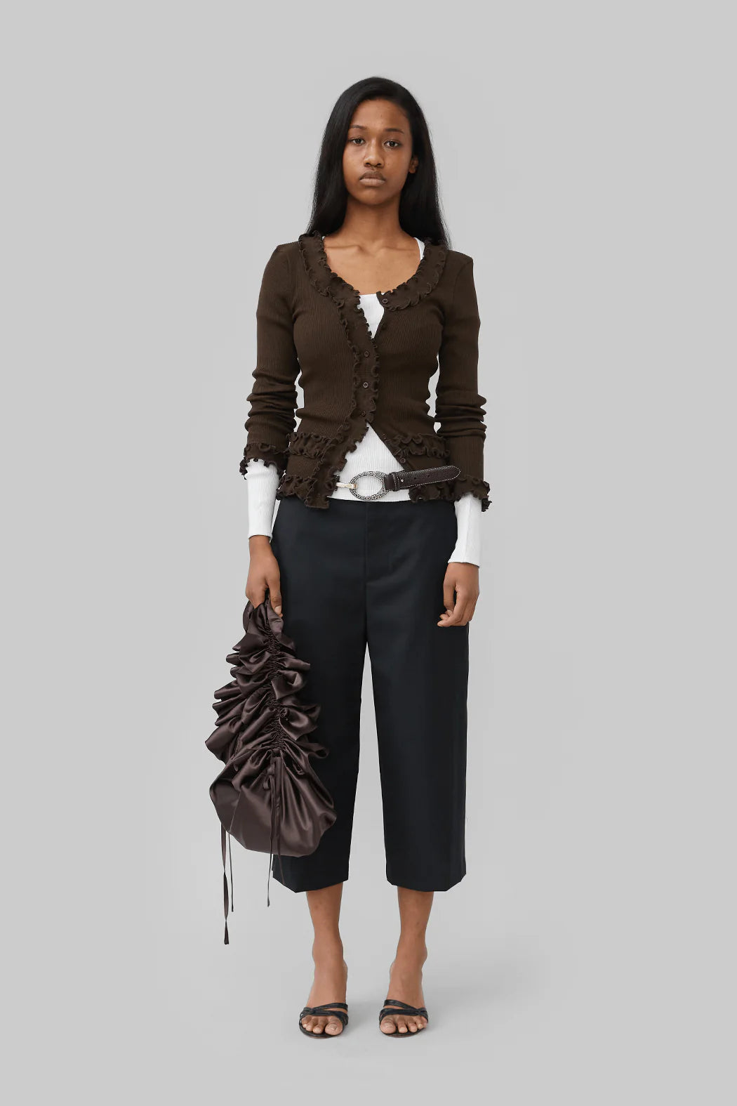 Full body look of model wearing Caroline Seamless Cardigan in Brown