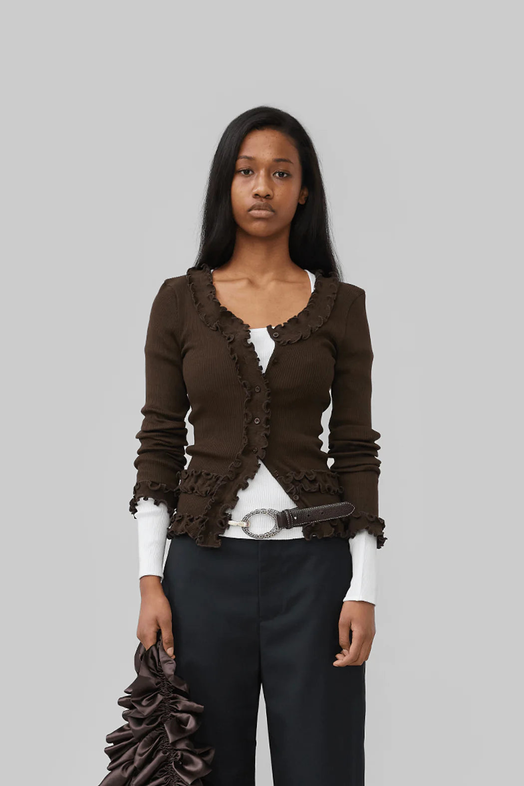 Model wearing Caroline Seamless Cardigan in Brown front view