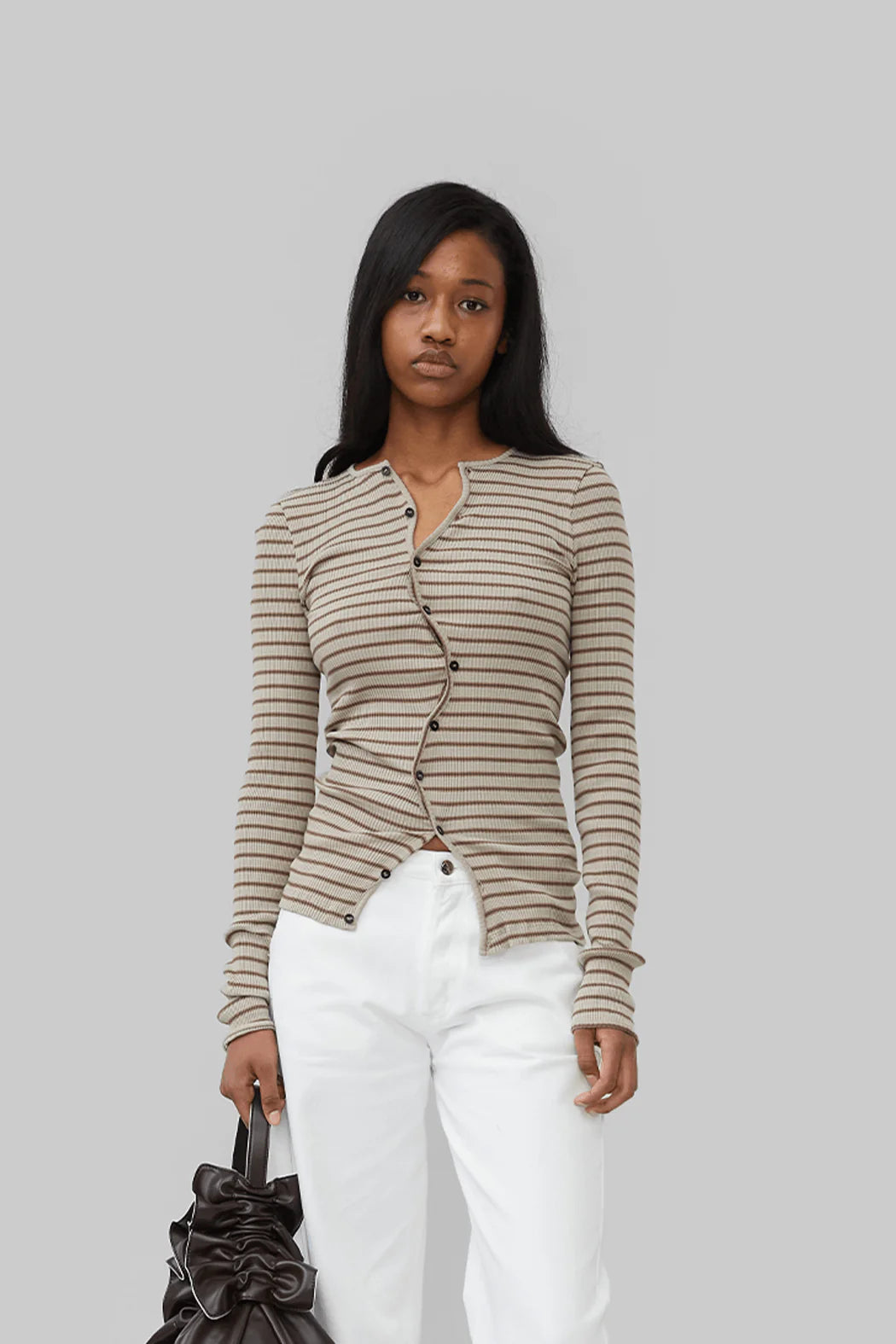 Model wearing Djerf Avenue Claire Seamless Cardigan Stripes