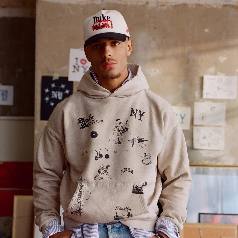 Model wearing Duke + Dexter Duke Pit Stop Cream Cap
