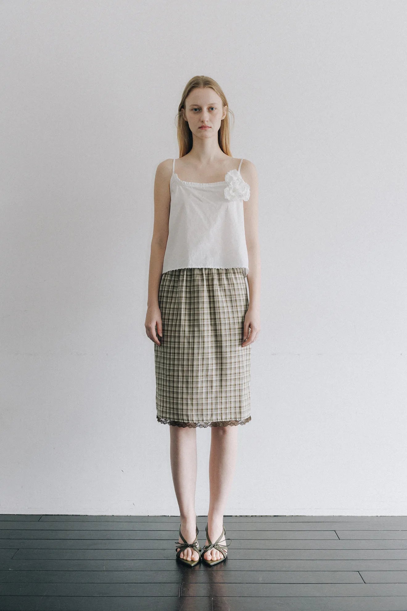 Model wearing Embroidered Lace Check Skirt in Khaki