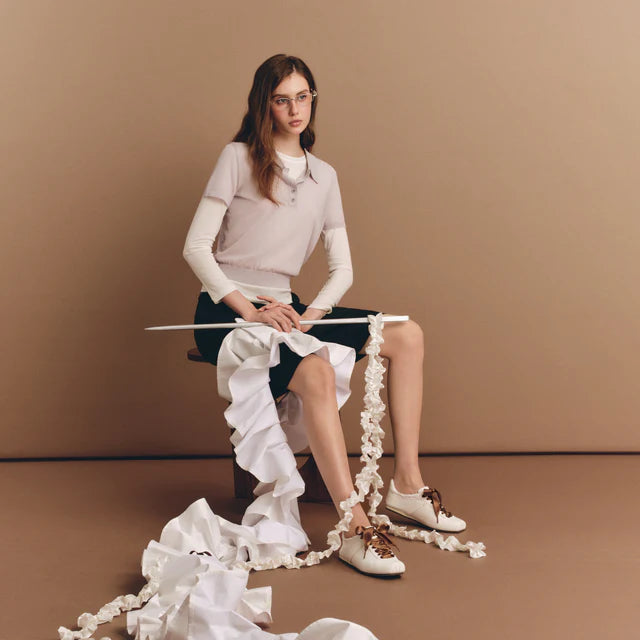 Model wearing Foot Industry Ballet Training White ballet-inspired sneakers