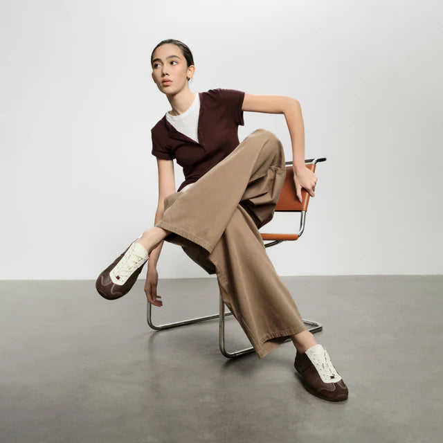 Model wearing Foot Industry GAT Ballet Brown Antique White sneakers