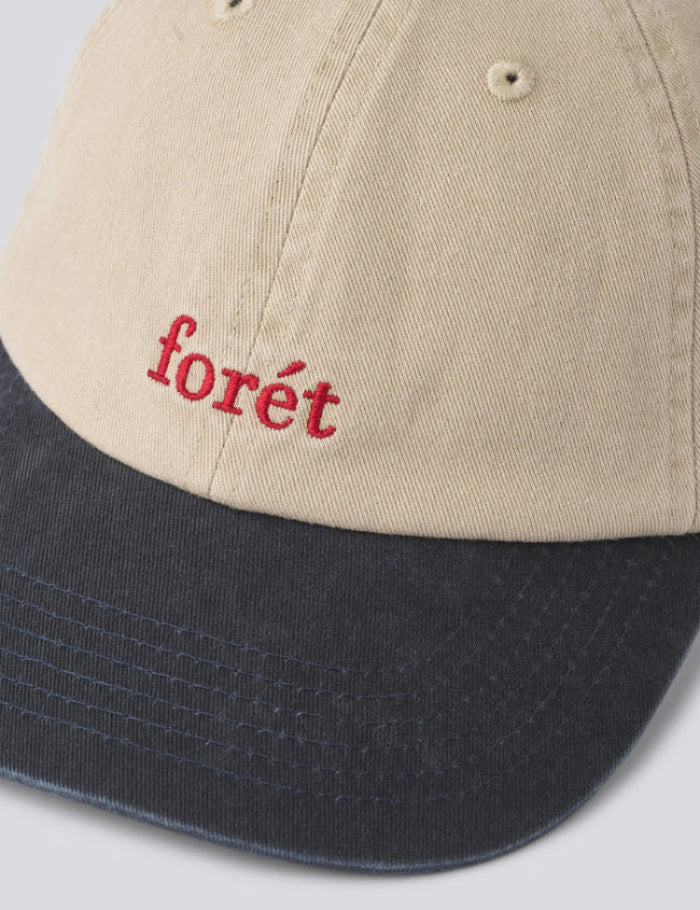 Top view of Foret Hawk 2-tone cap showing embroidered logo in khaki and navy
