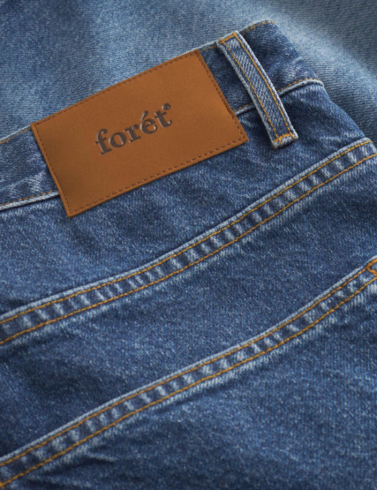 oret logo patch detail on Heath regular fit jeans washed mid blue