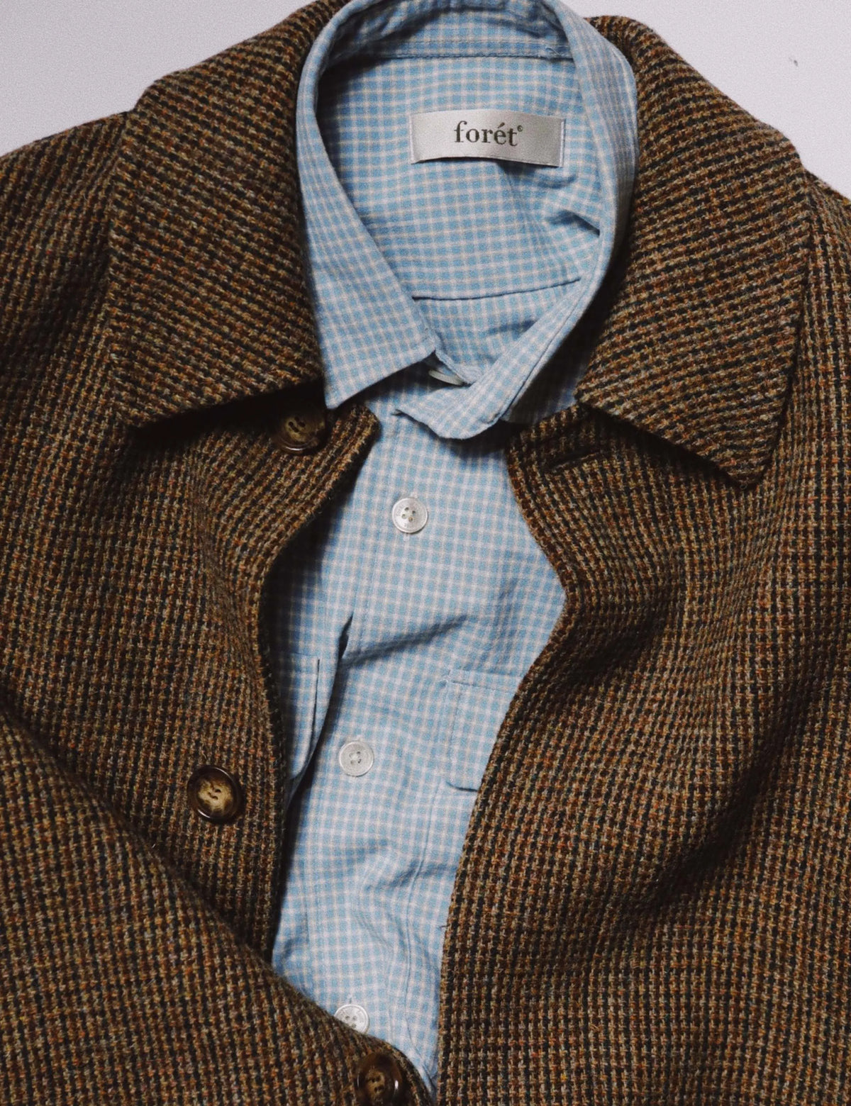 Collar detail of Foret Lunar Relaxed Fit Textured Overshirt in Light Blue Check