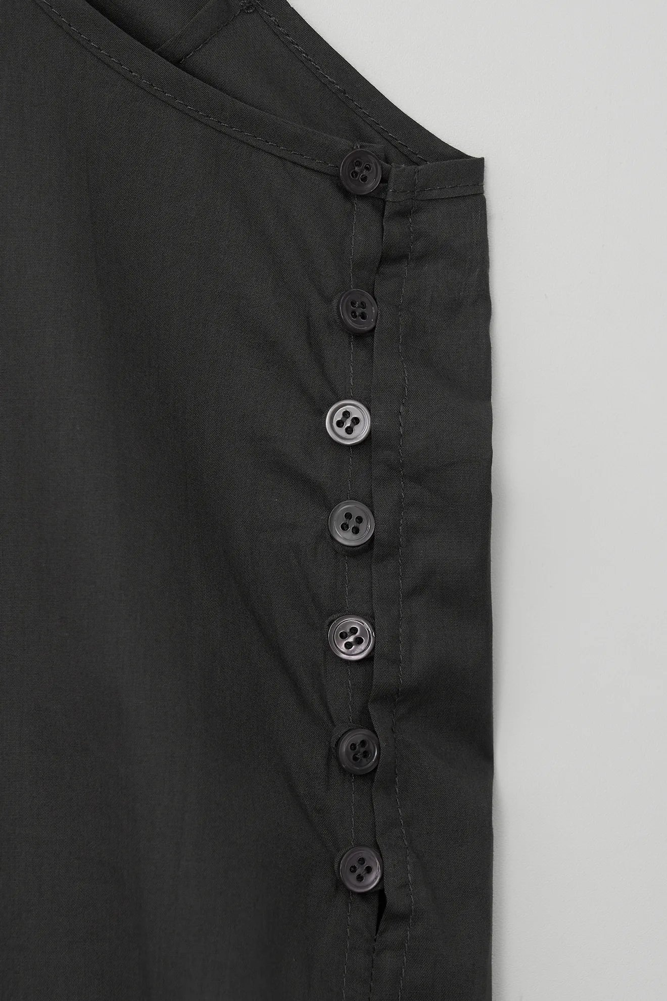 Button detail of Frilled and Embroidered Blouse in Black
