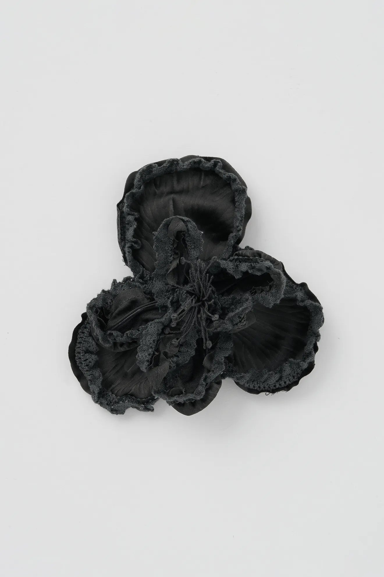 Floral appliqué detail of Frilled and Embroidered Blouse in Black