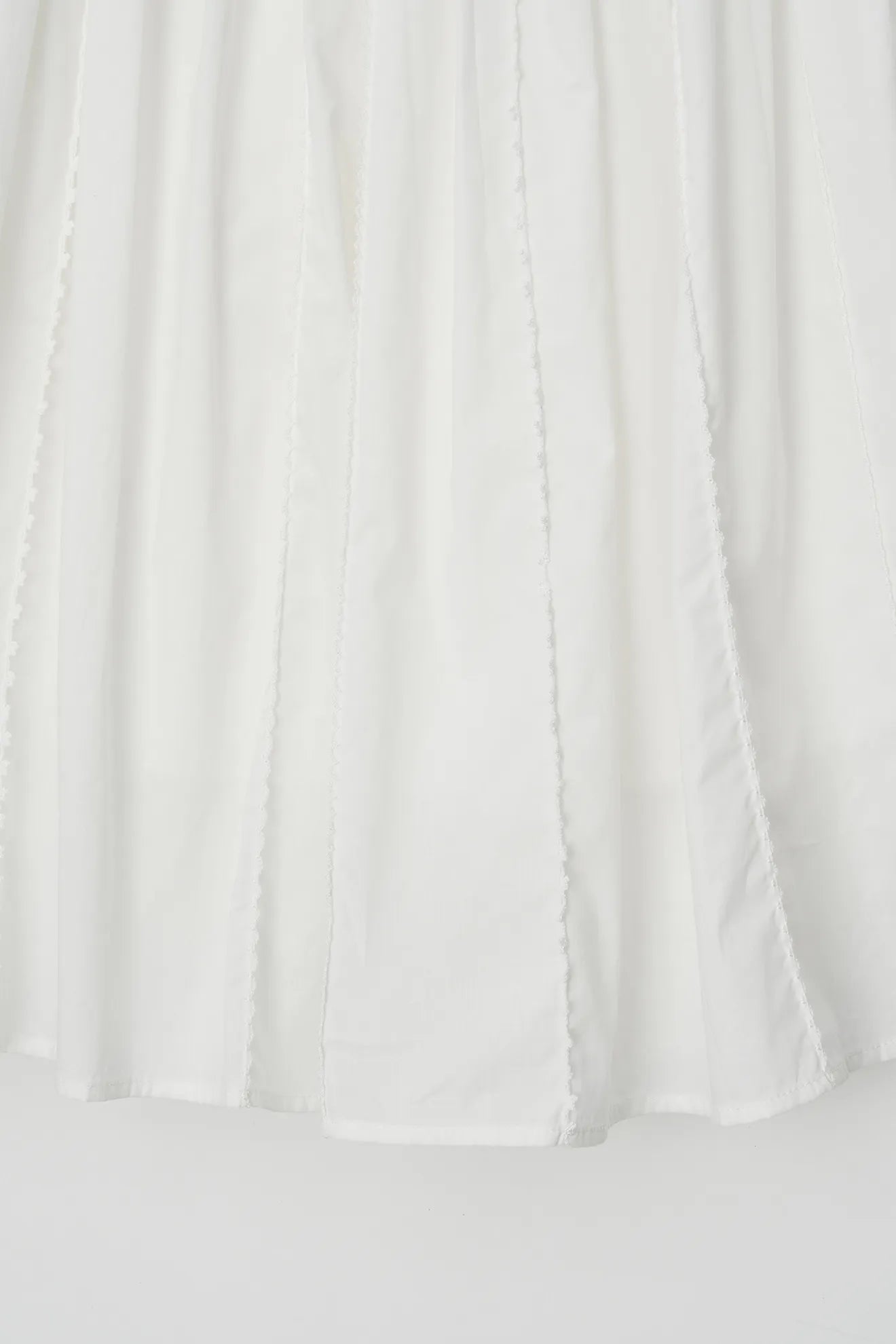 Embroidered hem detail of Frilled and Embroidered Skirt in White