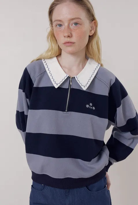 Front view of model wearing FRITUR Embroidery Round Collar Sweatshirt in Light Blue