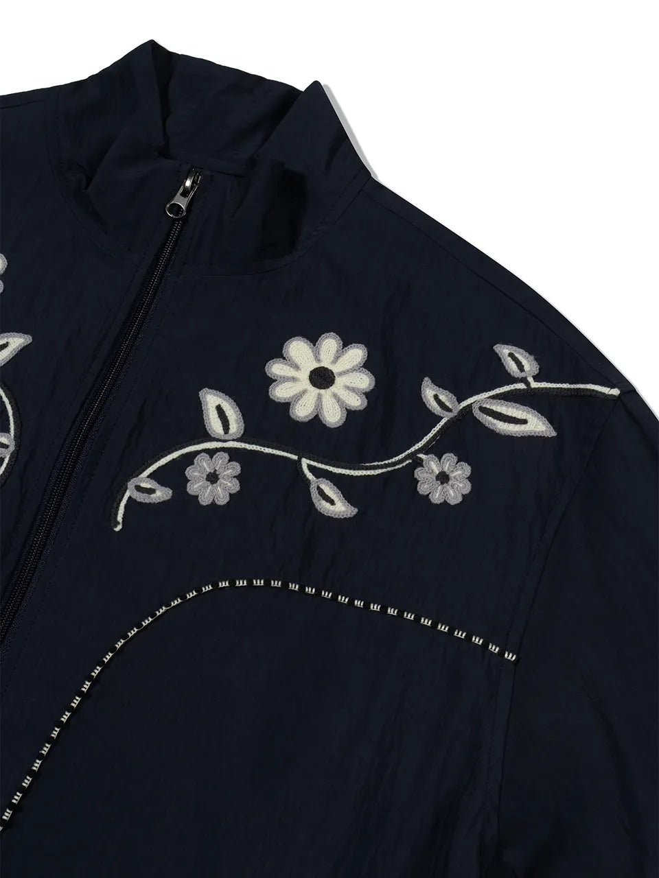 Embroidered chest detail of FRITUR Embroidery Western Windbreaker in Navy
