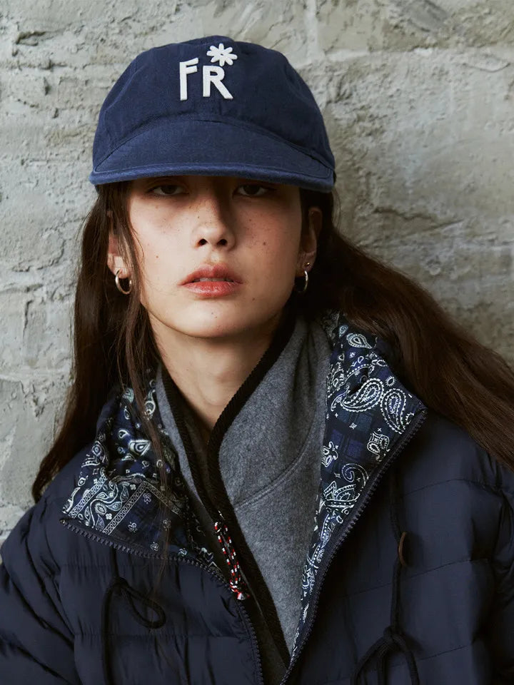 Front view of model wearing FRITUR Icon Ball Cap in Navy