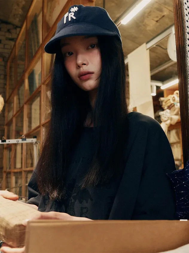Lifestyle look featuring FRITUR Icon Ball Cap in Navy