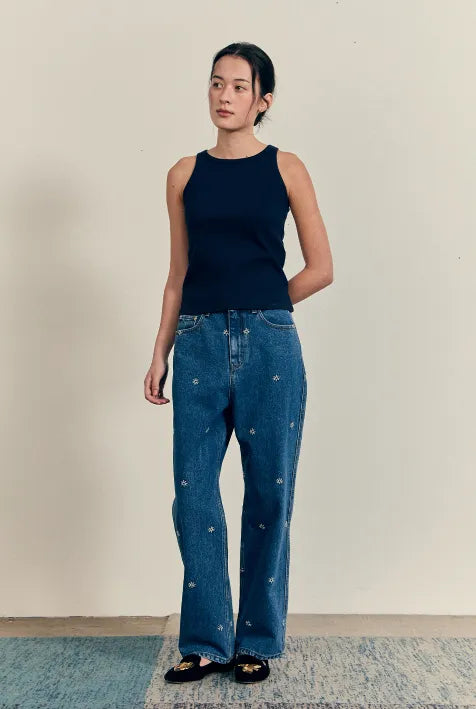 Model wearing FRITUR Kyoto Denim Pants in Blue