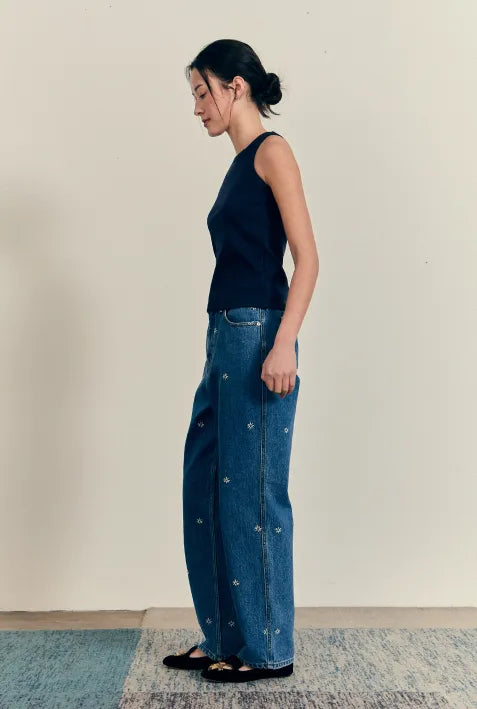 Side view of model wearing FRITUR Kyoto Denim Pants in Blue