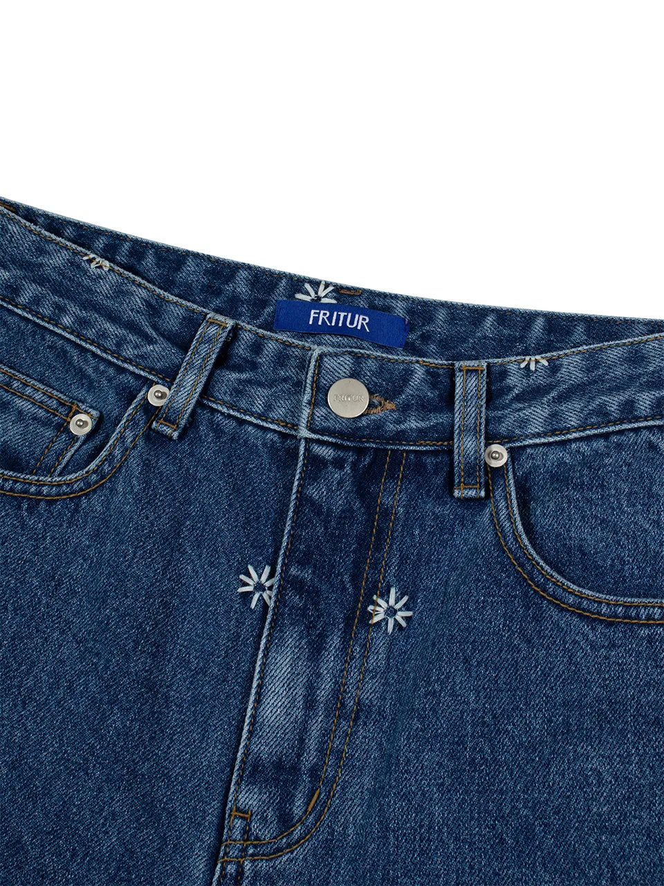Waist and pocket detail of FRITUR Kyoto Denim Pants in Blue