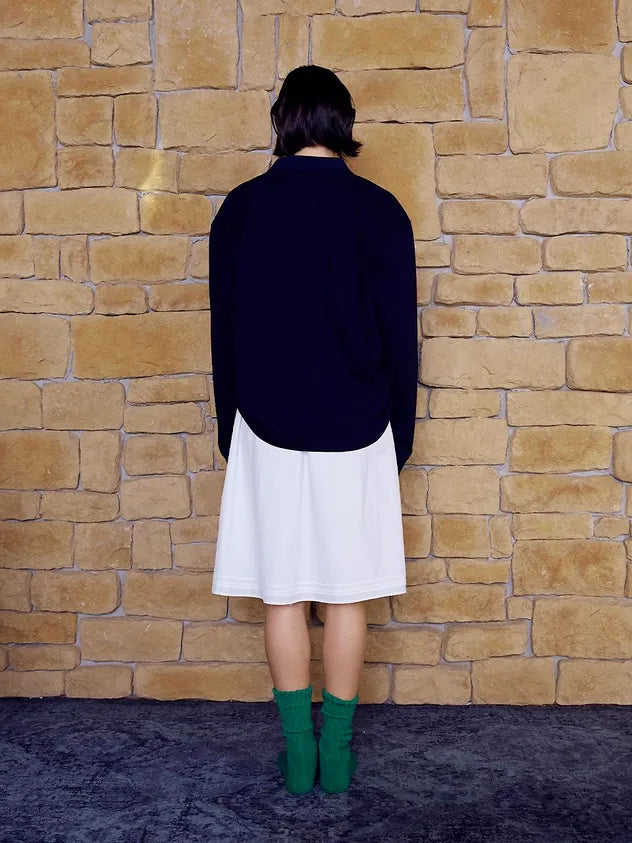 Back view of model wearing FRITUR Languid Pique Shirt in Navy