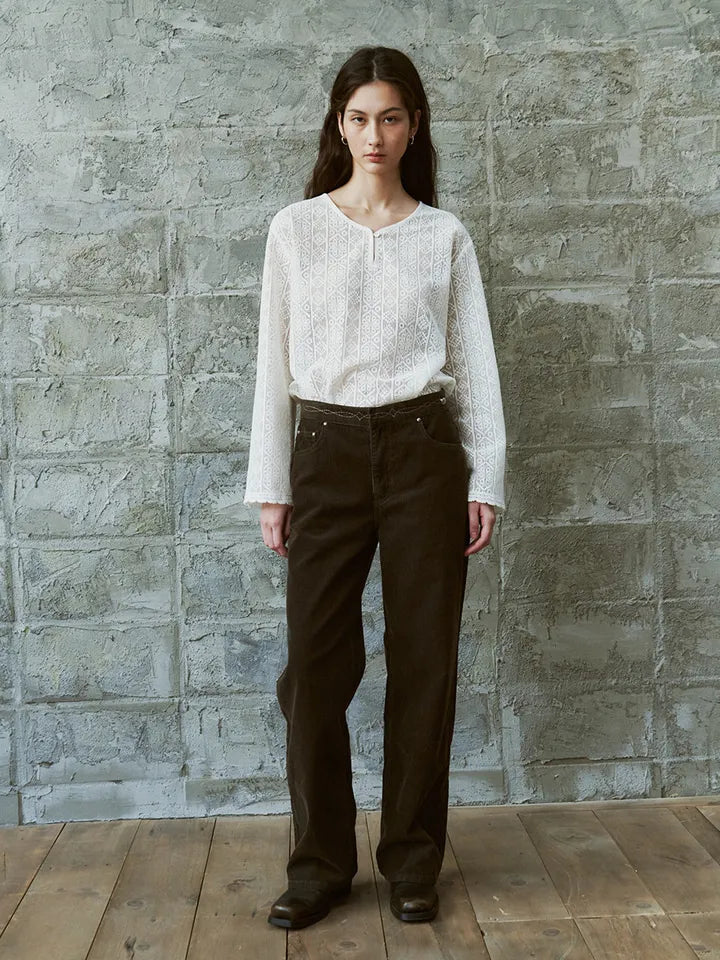 Side view of model wearing FRITUR Layered Corduroy Pants in Khaki
