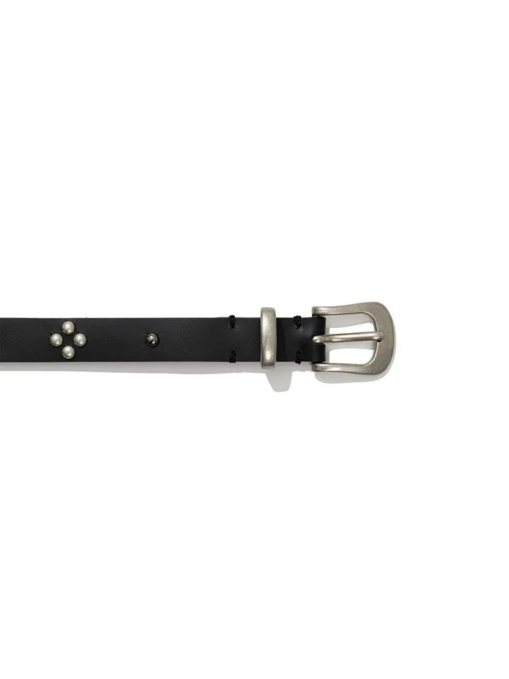 Close-up of FRITUR black stud leather belt buckle