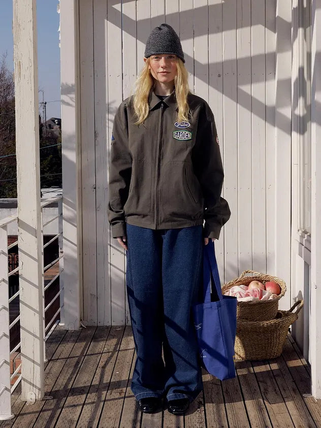 Side view of model wearing FRITUR Traveller Bomber Jacket in Khaki