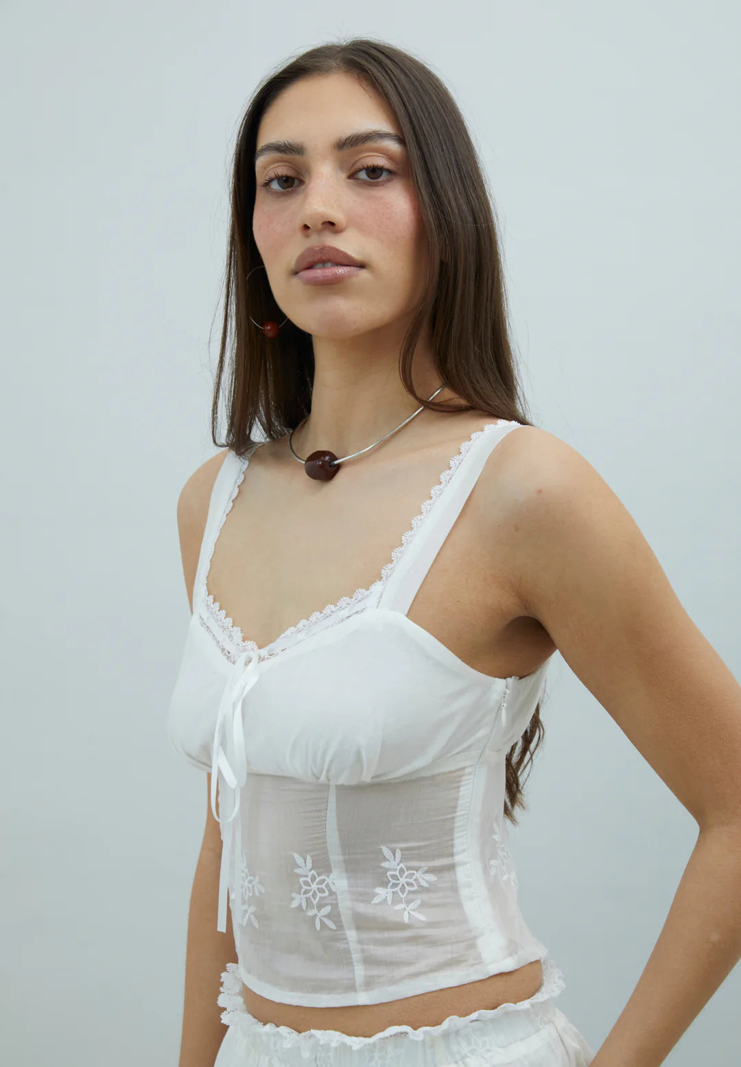 Three-quarter view of House of Sunny Blossom Top Ivory