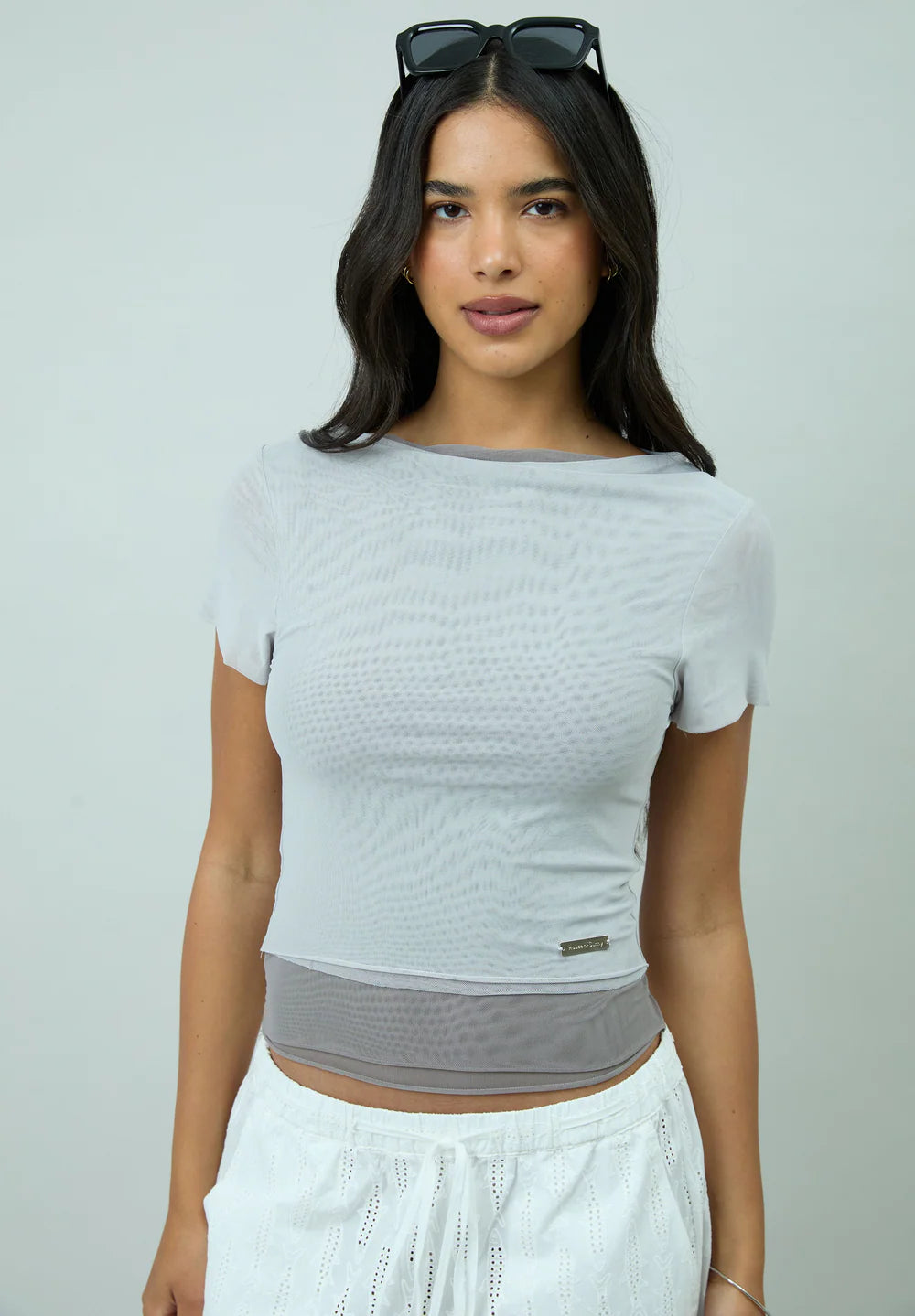 Front view of model wearing House of Sunny Double Layer Mesh Top in Grey