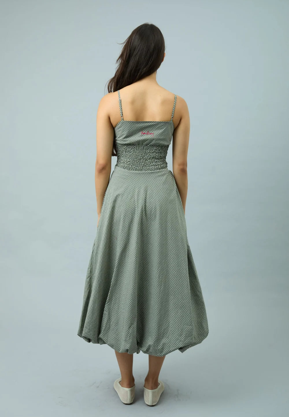 Back view of model wearing House of Sunny Gingham Balloon Cami Dress in Multi Check