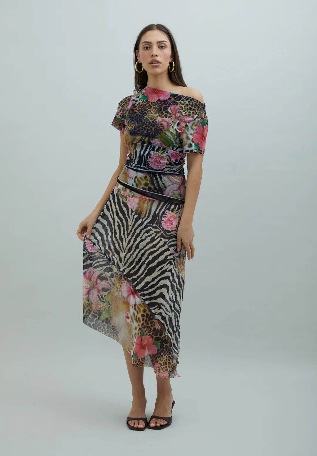 Hem detail of House of Sunny Tropical Mesh Skirt Multi