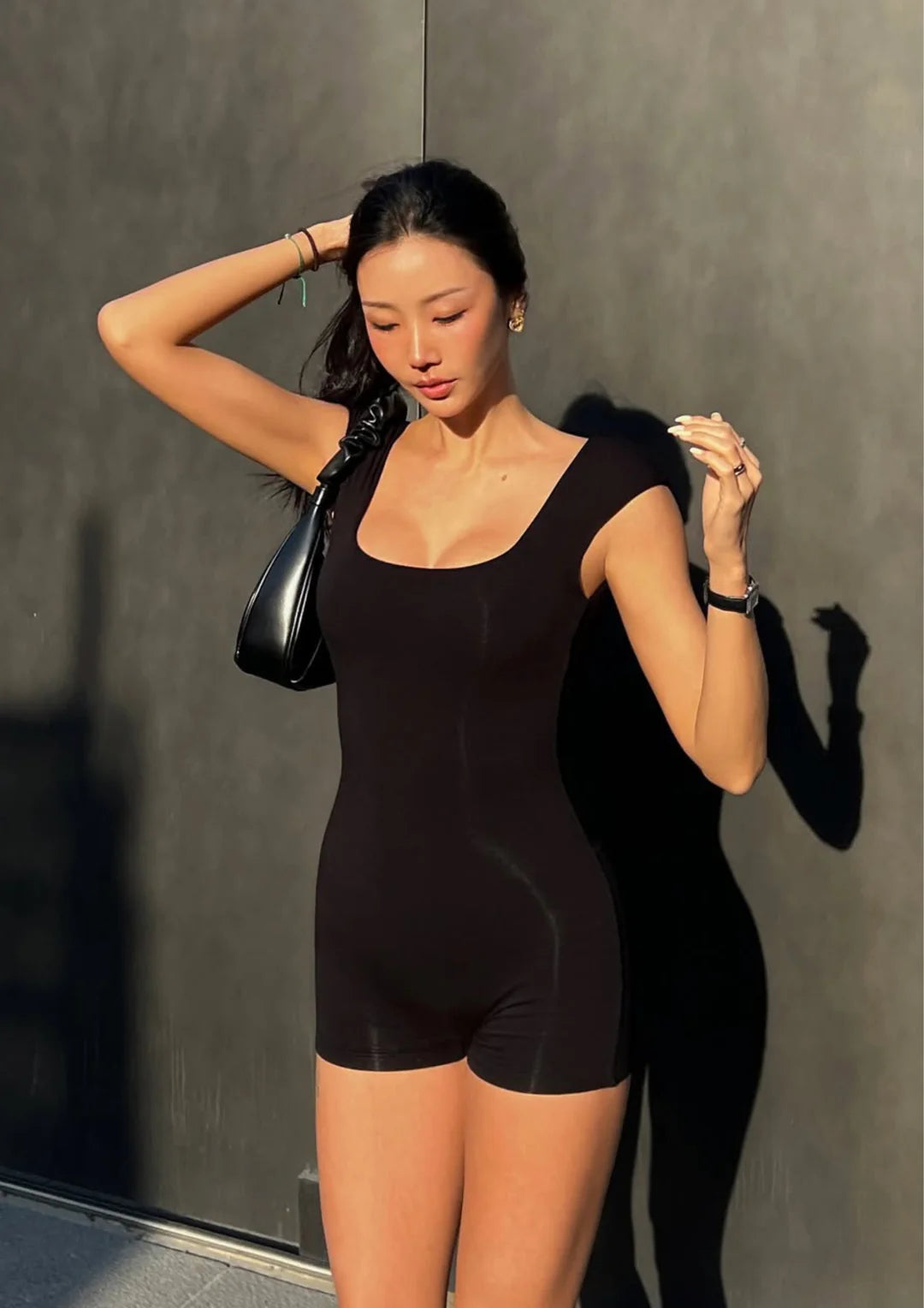 Front view of model wearing Kamari Backless Onesize Black