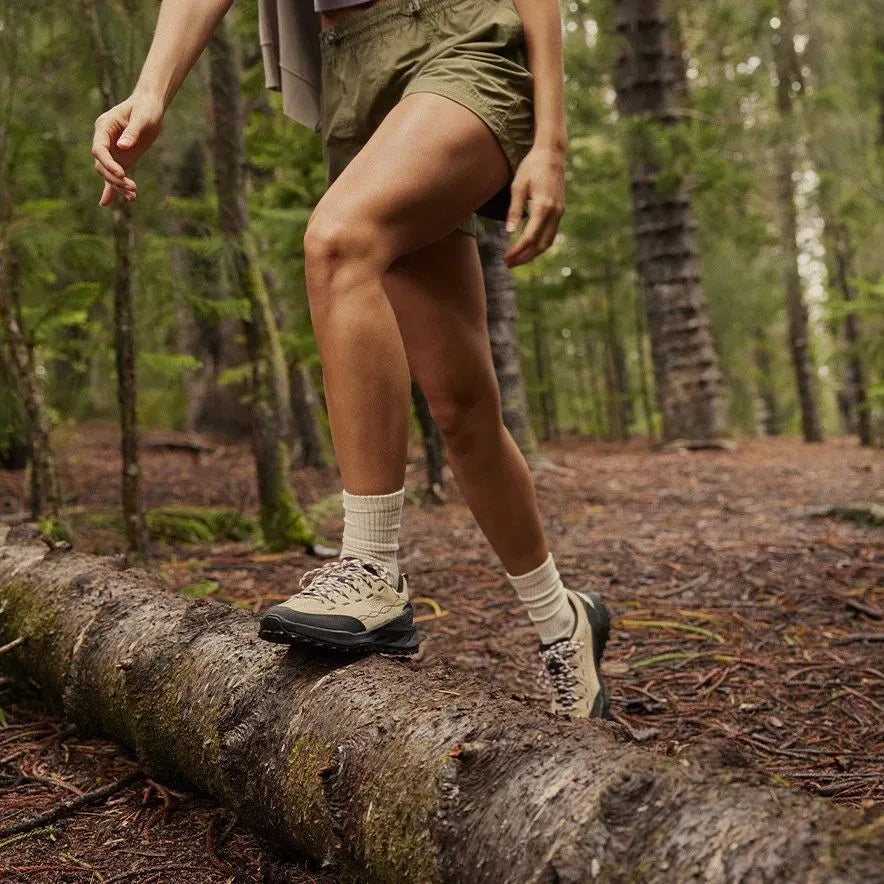 Model wearing KEEN Women’s Jasper Zionic sneakers in Safari Pink outdoors