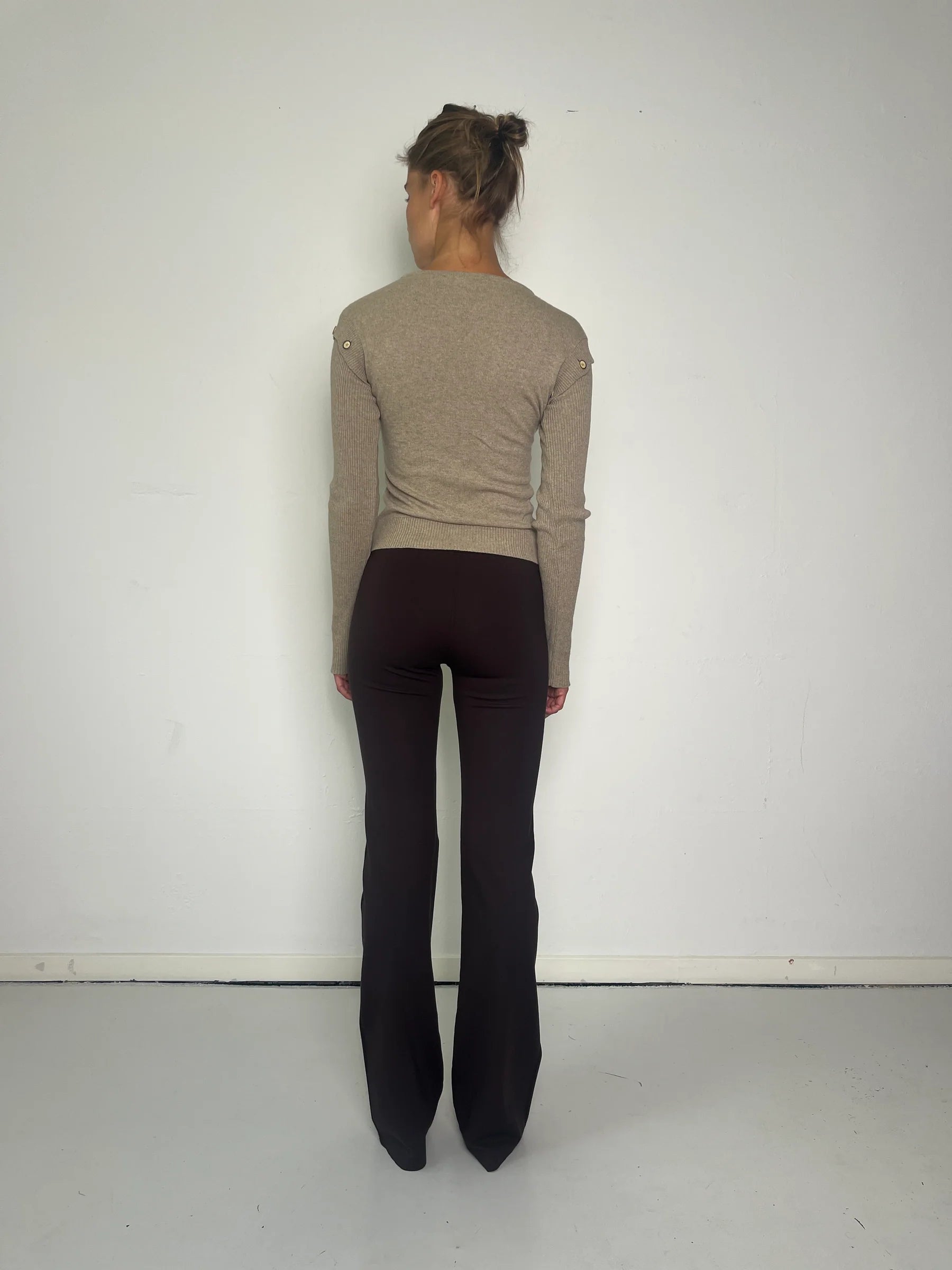 Back view of model wearing Kernemilk Caroline Cardigan Beige