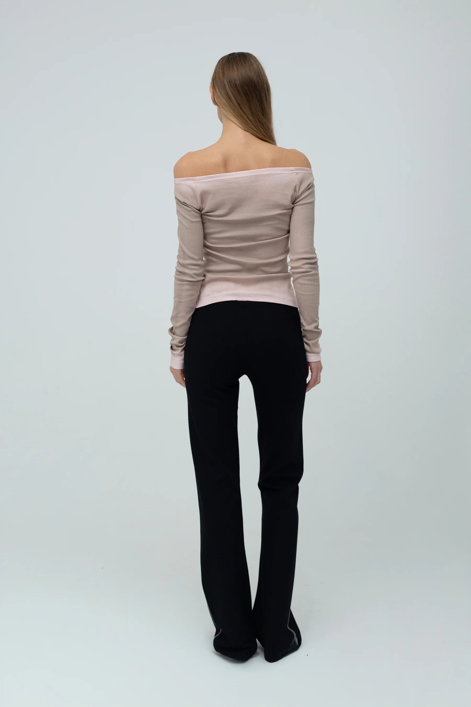 Back view of Matilda Cardigan light pink on model slim fit silhouette