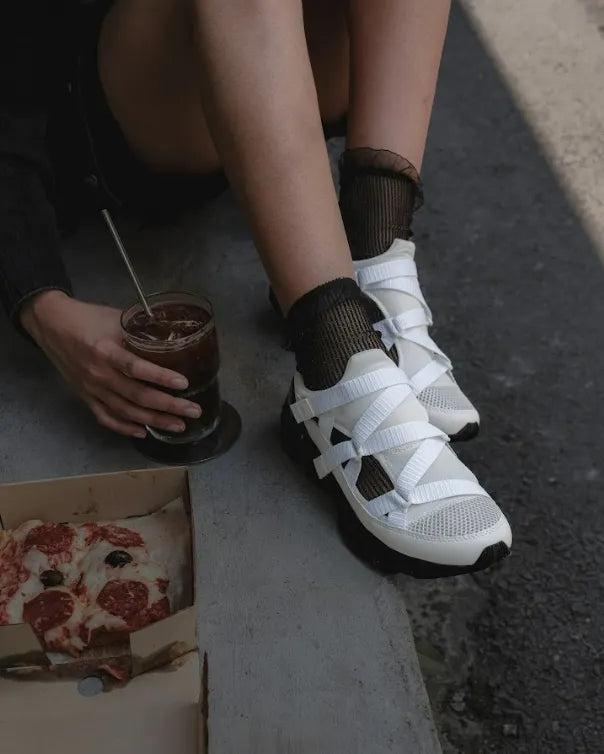 Model wearing Mizuno Wave Prophecy Strap in White Black