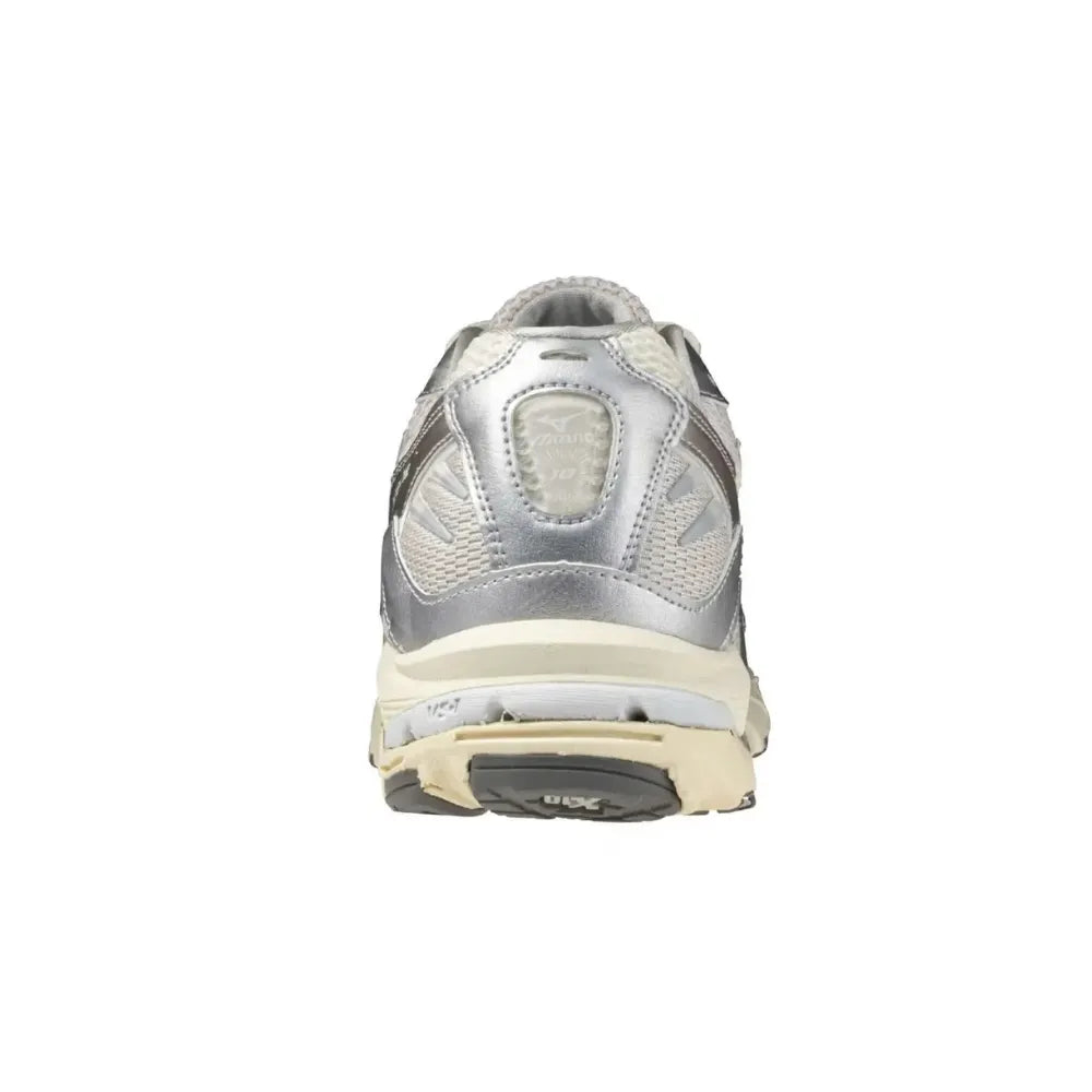 Heel view of Mizuno Wave Rider 10 in Light Beige Silver