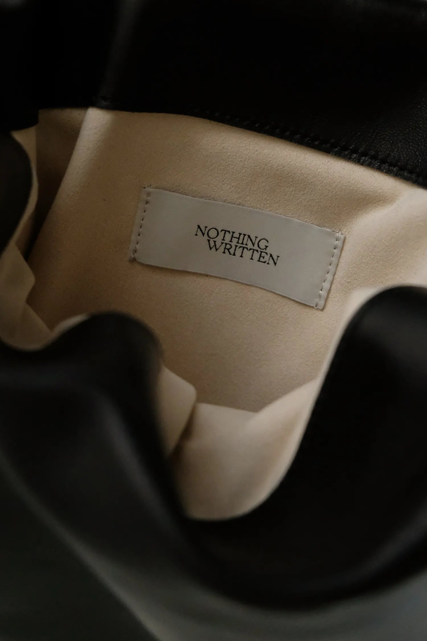 Logo detail inside Nella Strap Large Bag in Black